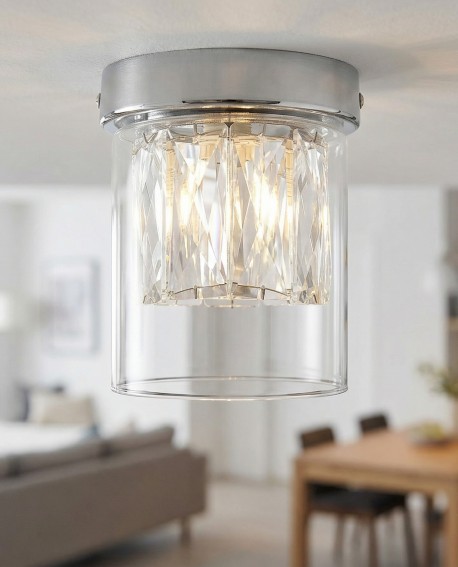 chromowana lampa sufitowa natynkowa w salonie z transparentnym kloszem eleganckie światło producent Lampit model Deni