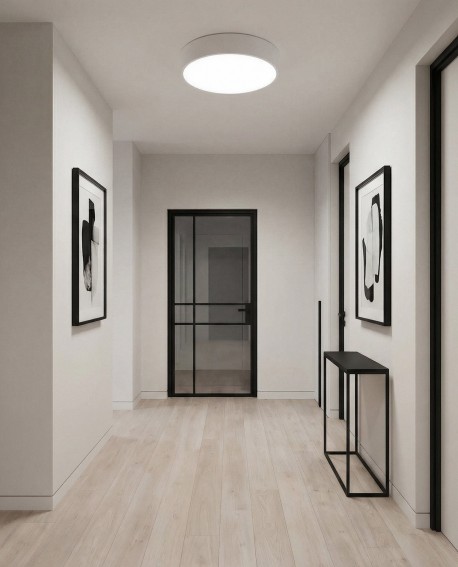 biały plafon sufitowy LED o okrągłym kształcie dający jasne światło w korytarzu model NEVO D40 od producenta lampit