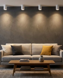 białe lampy sufitowe natynkowe spot tuba oświetlające salon nad sofą z wykorzystaniem modelu Nati W1 od producenta Lampit