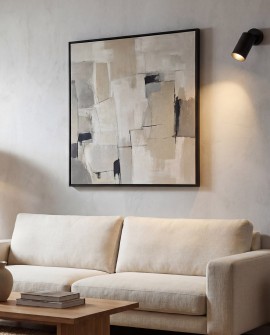 kinkiet do salonu nad sofę Lampit tworzy nastrojowe oświetlenie i podkreśla dekoracje na ścianie