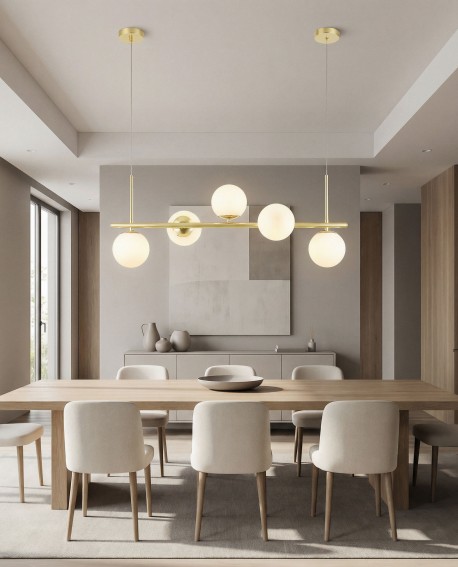 lampa wisząca Lampit w kolorze klasycznego złota nad stół do jadalni pięć szklanych kul tworzy przytulną atmosferę