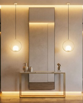 minimalistyczna lampa wisząca Lampit złota forma z kulistym kloszem podkreśla styl glamour i nowoczesny charakter