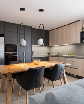 lampa wisząca Lampit czarna do jadalni nad stół subtelna kula światła buduje ciepły klimat spotkań