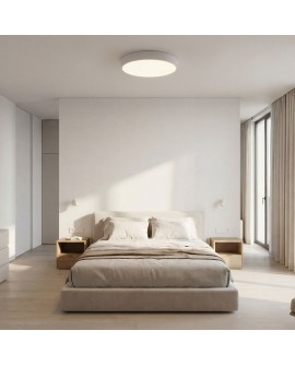 okrągła lampa sufitowa biała nad łóżkiem w jasnej sypialni stylowy plafon ORBO D50 do nowoczesnych wnętrz od Lampit