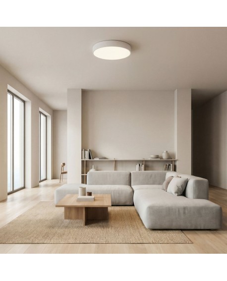 biały plafon LED w przestronnym salonie przy dużych przeszkleniach designerska lampa ORBO D50 nowoczesne oświetlenie Lampit