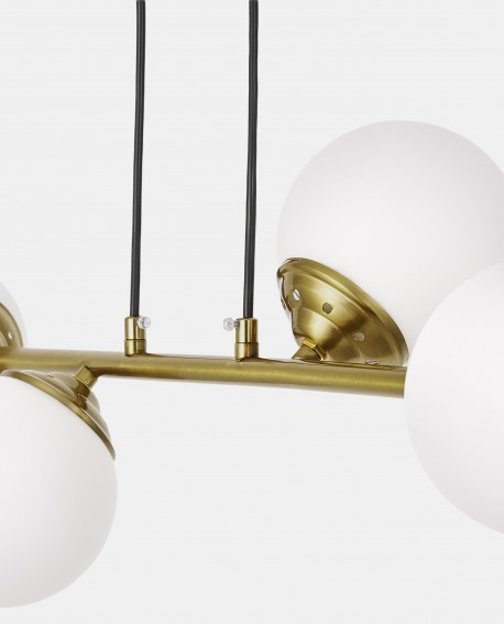 Wisząca lampa FINO W4 Lampit z czterema białymi szklanymi kulami na złotej belce