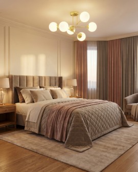 Designerska lampa FINO W6 w kolorze klasycznego złota zawieszona w sypialni nad łóżkiem