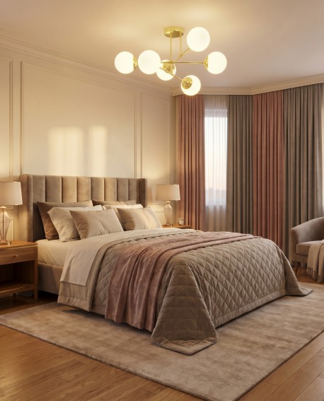 Designerska lampa FINO W6 w kolorze klasycznego złota zawieszona w sypialni nad łóżkiem