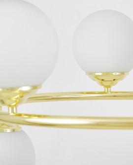 Fragment konstrukcji żyrandola FINO RING W6 z połyskującym złotym wykończeniem