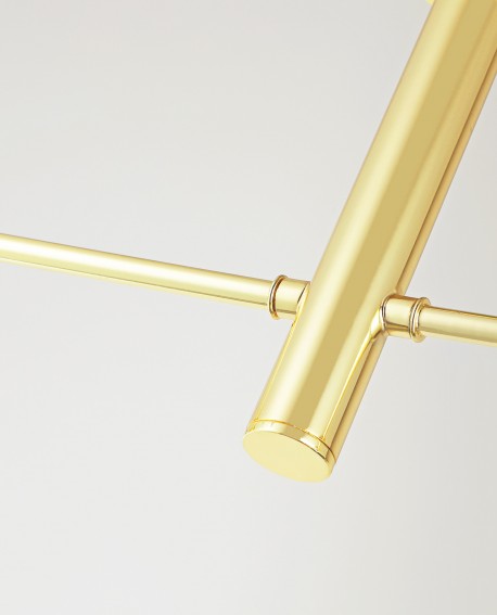 Detal złotej lampy sufitowej wiszącej z precyzyjnie wykończonym metalowym łącznikiem elegancja i minimalizm Lampit Fino W2