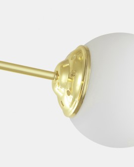 Fragment mocowania szklanego klosza złotej lampy FINO W4