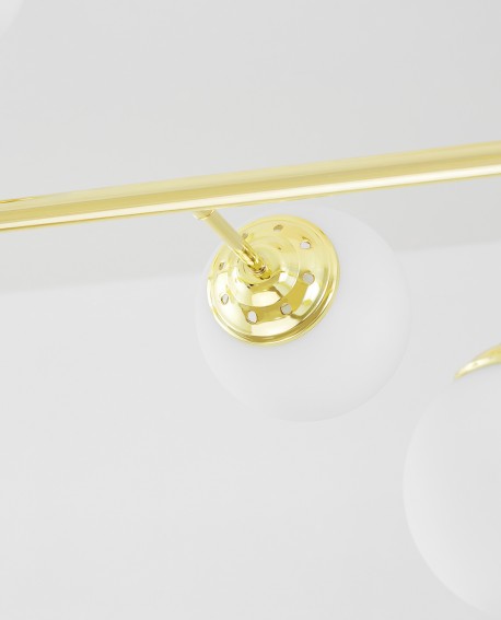 Fragment lampy wiszącej Lampit Fino W6 detal złotej części i białego szkła
