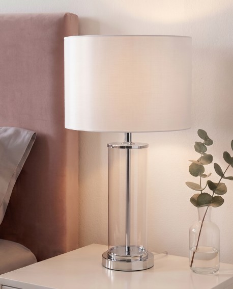 Elegancka lampa stołowa z metalowym i szklanym wykończeniem w sypialni