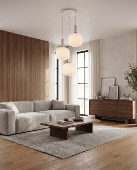 Potrójna lampa wisząca GATO Lumina Deco z białymi mlecznymi kloszami w salonie z sofą
