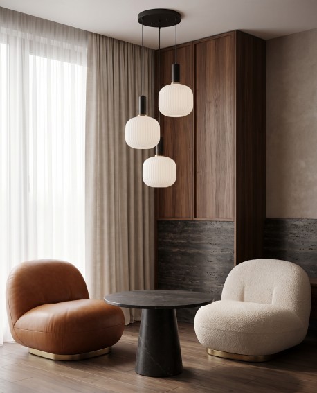 Szklane klosze lampy prezentujące loftowy styl nad strefą relaksu