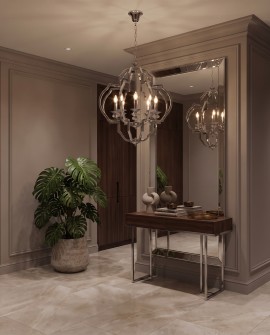 Ośmiopunktowa lampa wisząca w stylu glamour zawieszona w holu z dużym lustrem