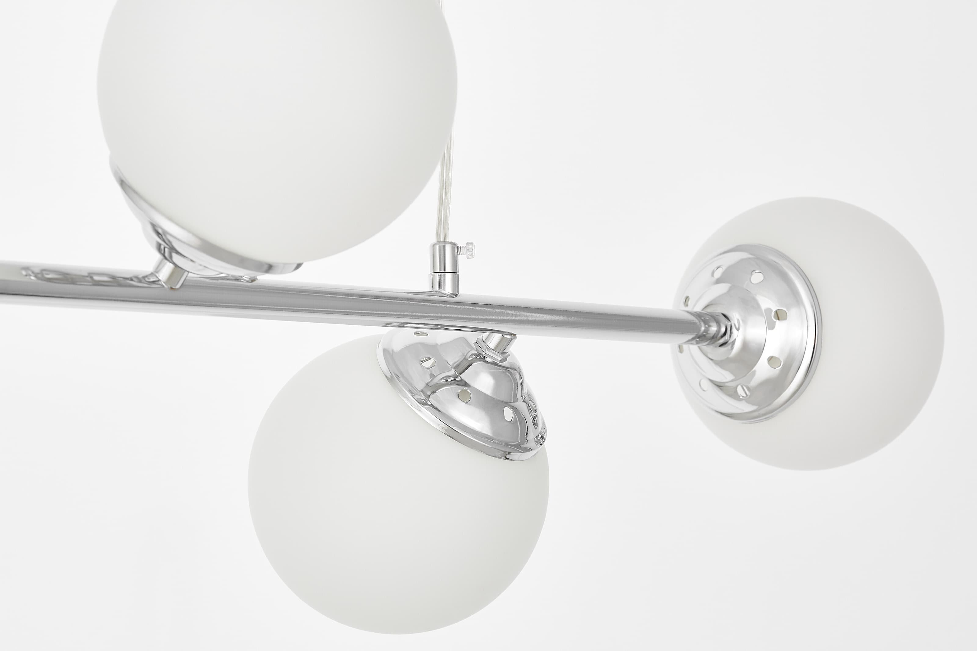 Nowoczesna lampa wisząca chromowana FINO W4 we wnętrzu
