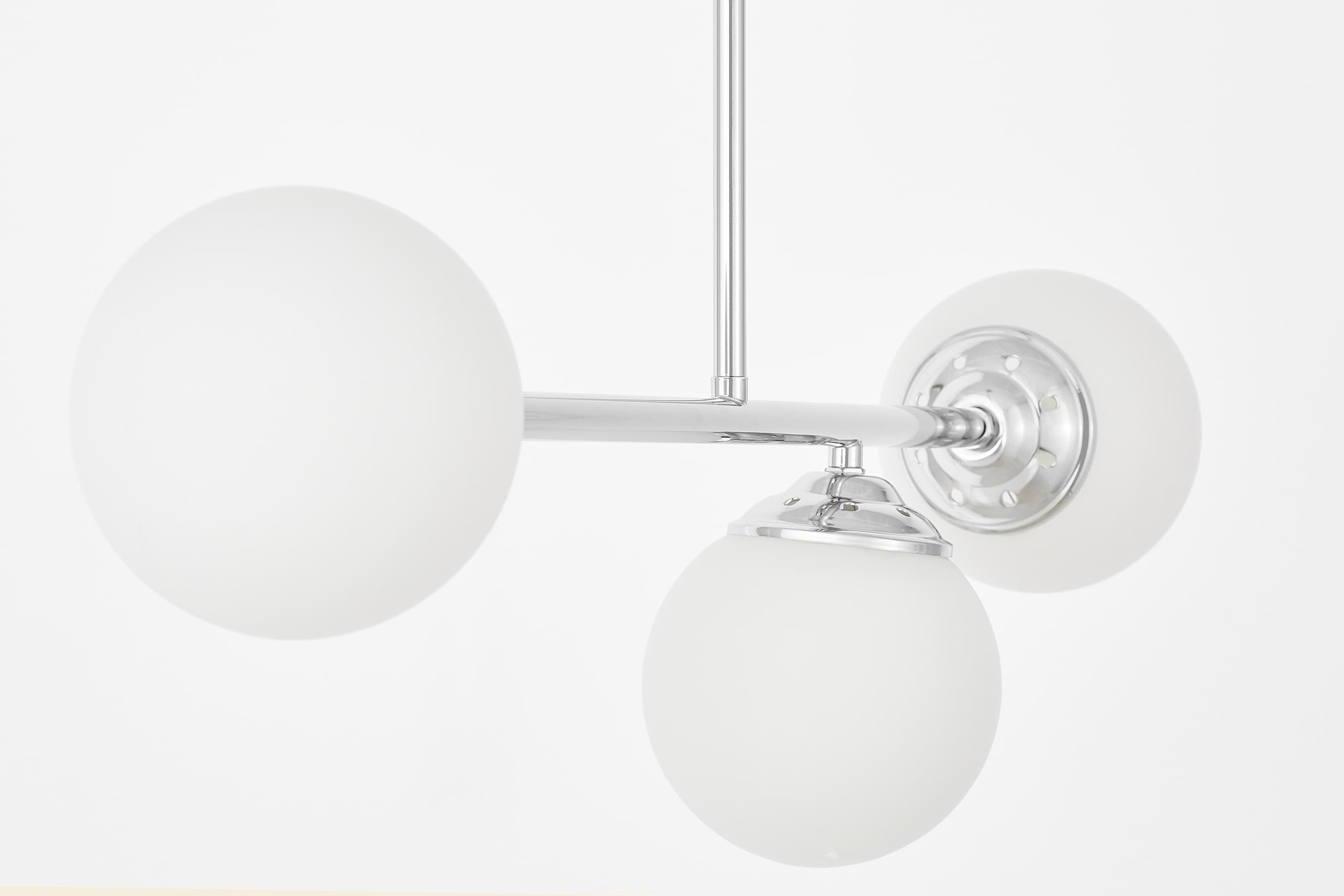 Nowoczesna lampa sufitowa wisząca chromowana FINO W3 w aranżacji